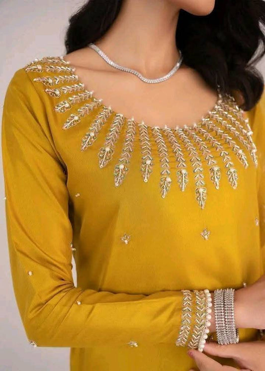 3 PC Kattan Silk Suit with Handwork and Organza Dupatta – A premium outfit for weddings and special events, combining elegance and traditional craftsmanship.