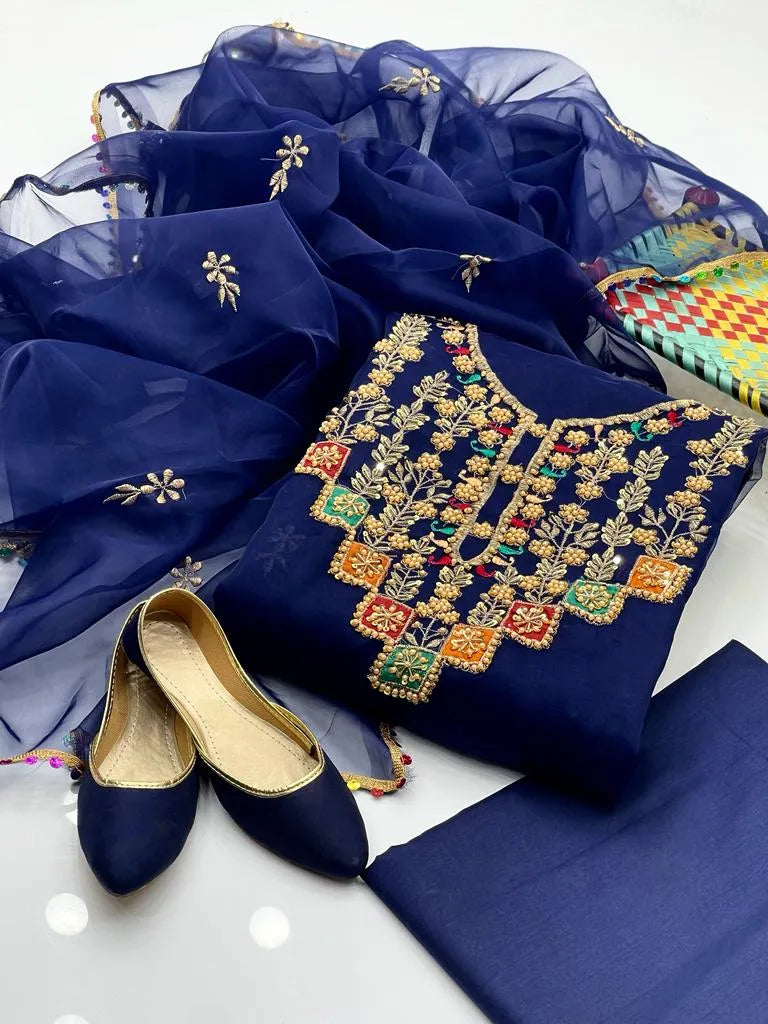 Handmade Ari patchwork organza shirt in striking blue, matched with Kathan silk trouser for a graceful and stylish appearance. Perfect for formal gatherings