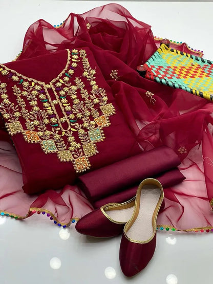 Handmade Ari patchwork organza shirt in rich red, beautifully complemented by Kathan silk trouser. A stunning outfit for weddings and special occasions