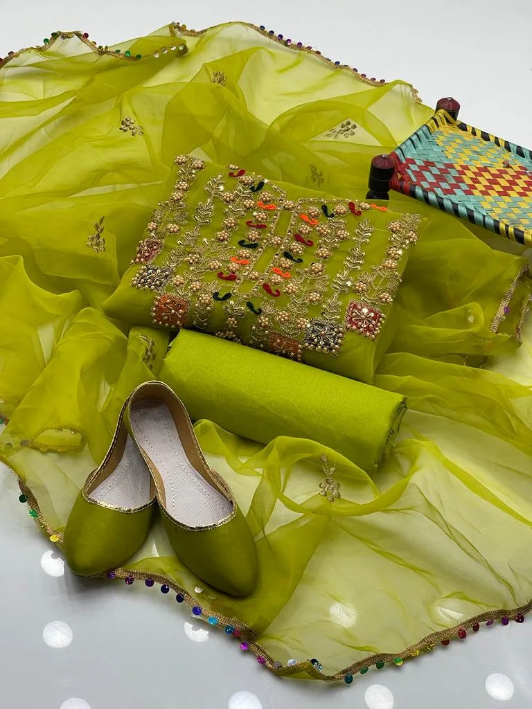 New Handmade Ari patchwork organza shirt in vibrant green, paired with Kathan silk trouser for a chic and elegant look. Perfect for festive wear.